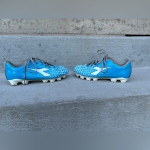 Diadora youth soccer cleats.